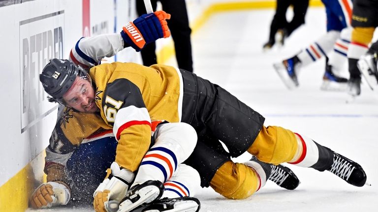 Vegas Golden Knights right wing Mark Stone (61) knocks Edmonton...