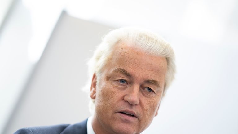 Anti-Islam lawmaker Geert Wilders answers questions after hearing the verdict...