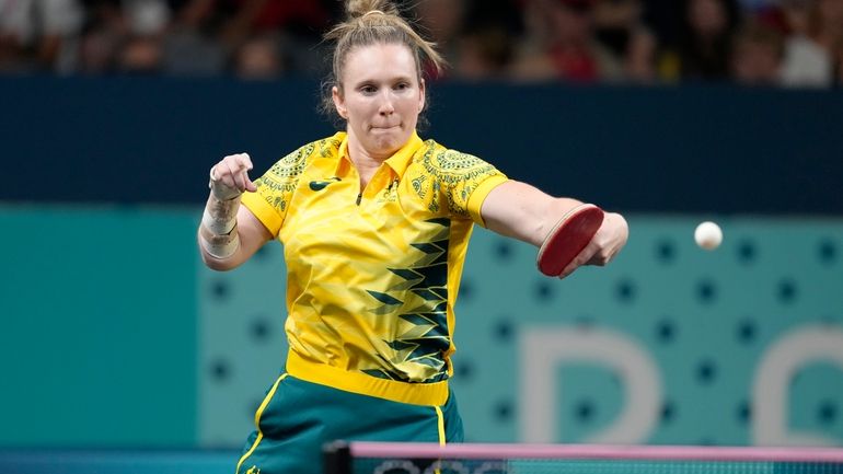 Australia's Melissa Tapper plays against South Korea's Shin Yubin during...