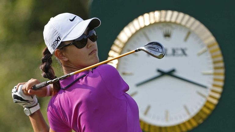 Michelle Wie watches her tee shot on the 10th hole...