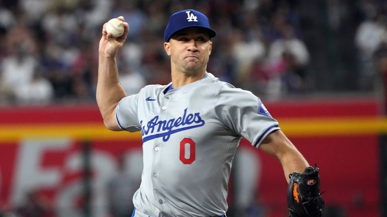 Los Angeles Dodgers pitcher Jack Flaherty throws against the Arizona...