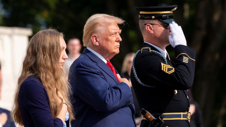 Former President Donald Trump, center, with Misty Fuoco, left, sister...