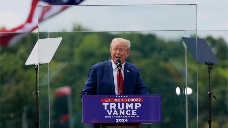 Republican presidential nominee former President Donald Trump speaks during a...