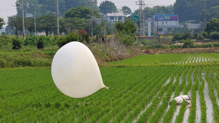 A balloon presumably sent by North Korea, is seen in...