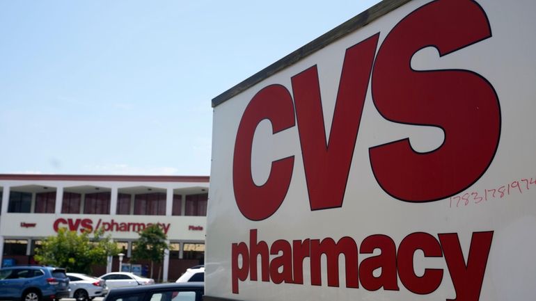 A sign marks a CVS branch on May 16, 2023,...