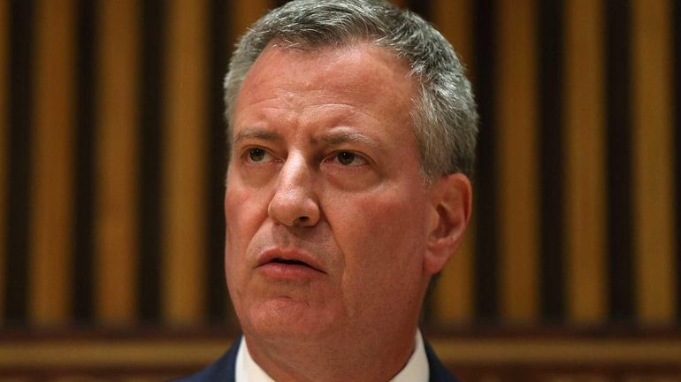 New York City Mayor Bill de Blasio speaks at police...