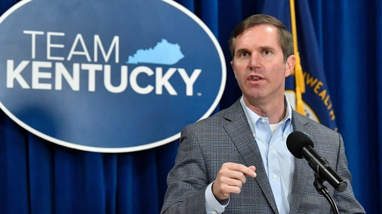 Kentucky Gov, Andy Beshear speaks in the Rotunda of the...