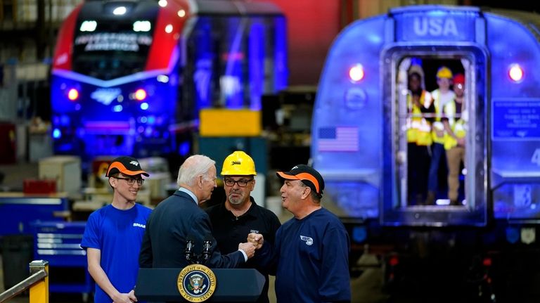 President Joe Biden, center left, meets with Thomas Rapposelli Jr.,...