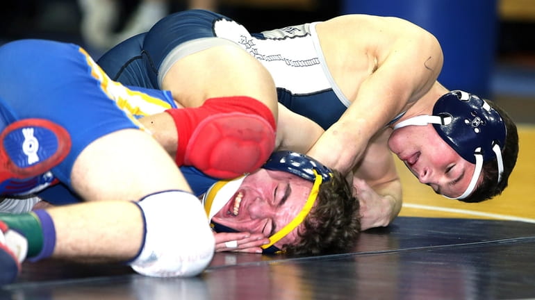 Oceanside’s Jake Strianese (right) defeated East Meadow’s Nicholas Rodriguez at...