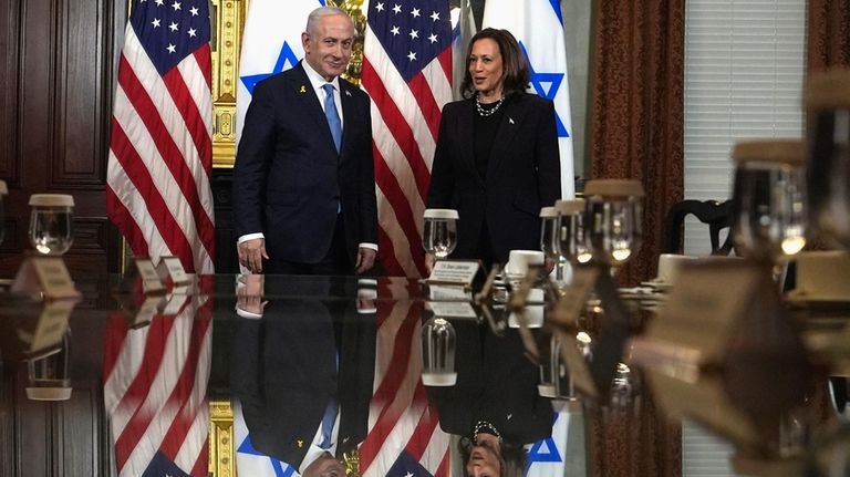 Vice President Kamala Harris, right, and Israeli Prime Minister Benjamin...