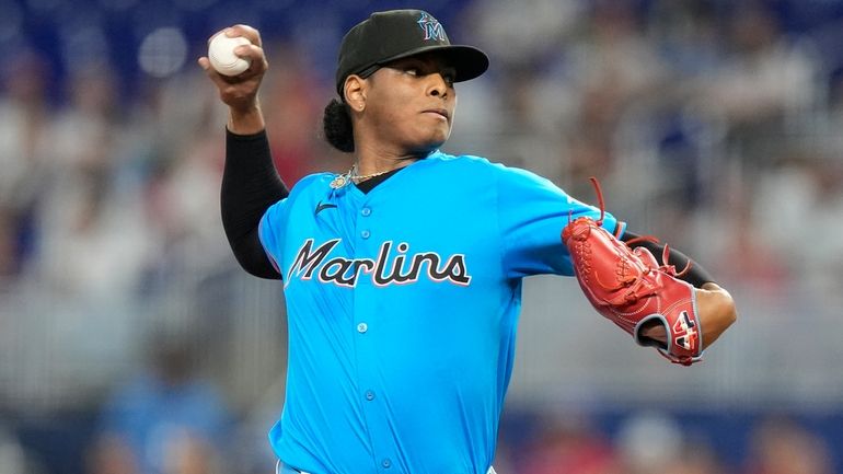 Miami Marlins starting pitcher Edward Cabrera throws during the first...