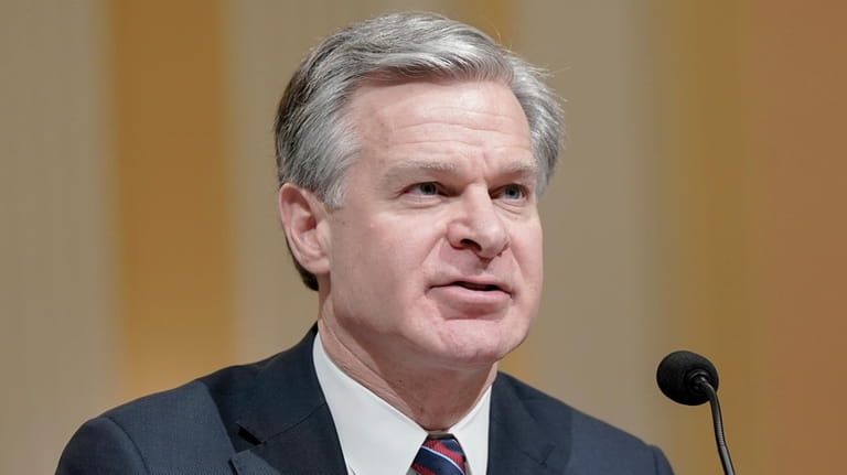 FBI Director Christopher Wray, testifies during a House Select Committee...