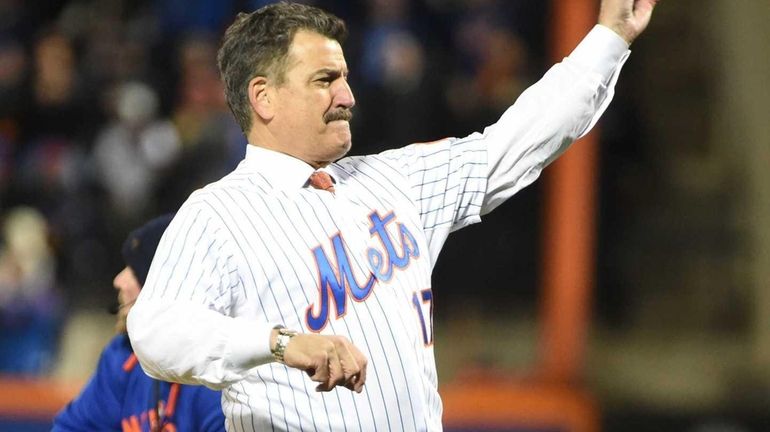 Mets great Keith Hernandez throws out the first pitch during...