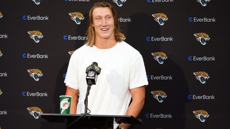 Jacksonville Jaguars quarterback Trevor Lawrence answers questions during a news...