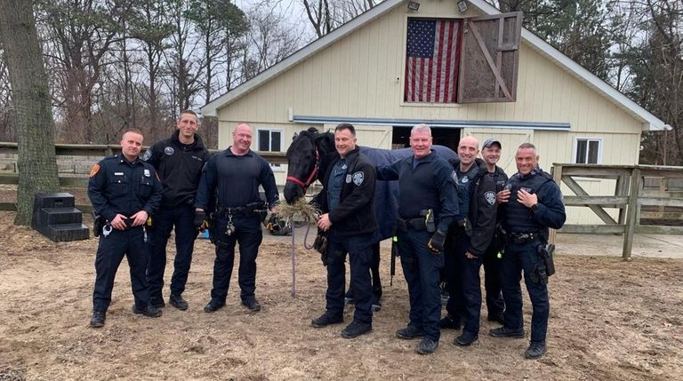 Suffolk police with Penny after the ordeal.