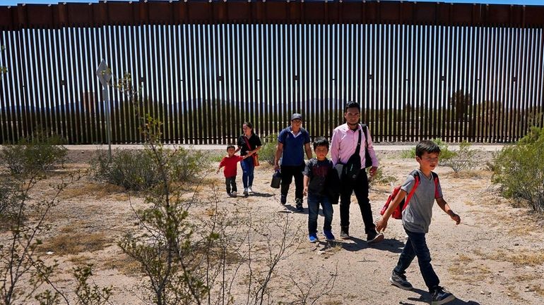 A family of five claiming to be from Guatemala and...