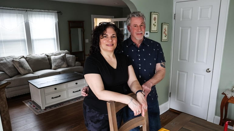 Michelle and Jack Gladstone in the Lindenhurst home they purchased after...