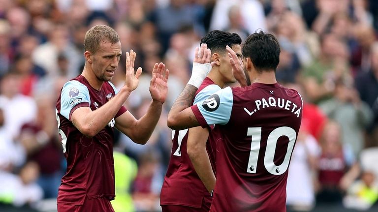 West Ham United's Tomas Soucek, left, celebrates scoring during the...