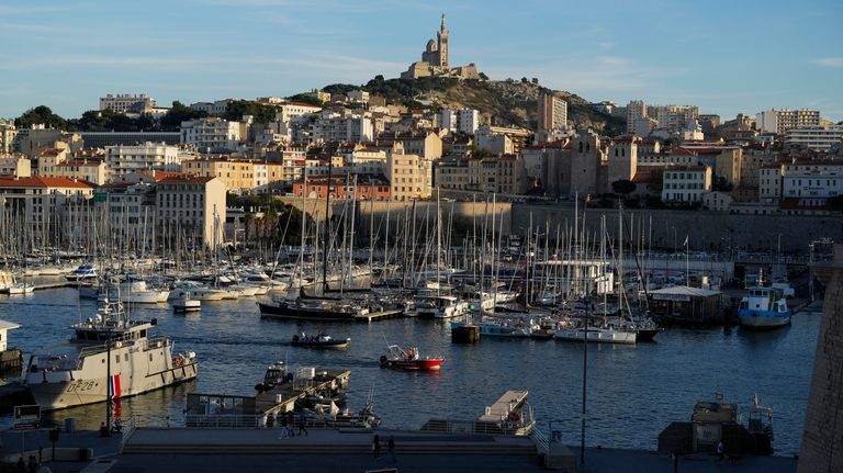 The Notre Dame de la Garde Basilica overlooks the harbor...