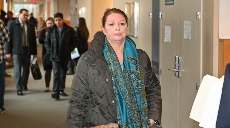 AnnMarie Drago arrives at Suffolk County District Court in Central...