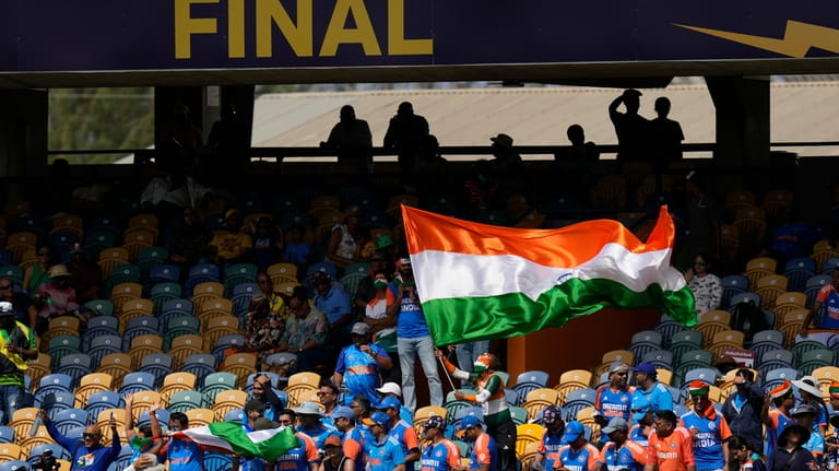 Indian fans cheer for their team before the ICC Men's...