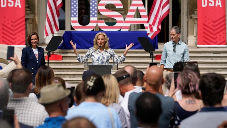 First lady Jill Biden, center, delivers remarks to family members...