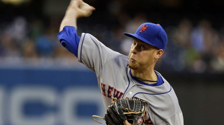 Mets starting pitcher Zack Wheeler works against the San Diego...