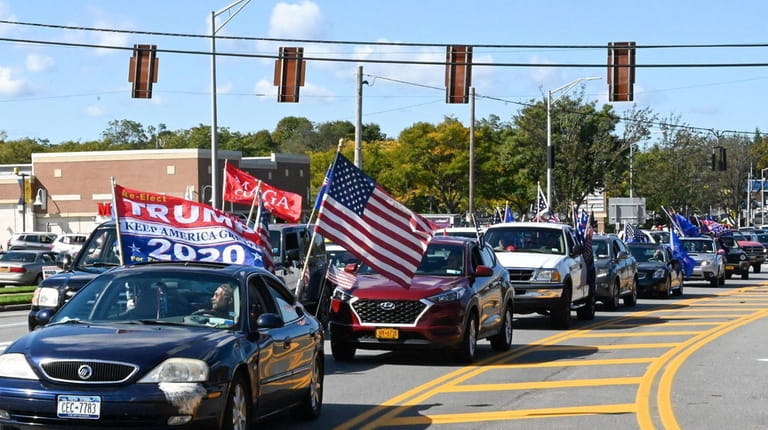 Trump supporters on Veterans Highway in Commack before a car parade...