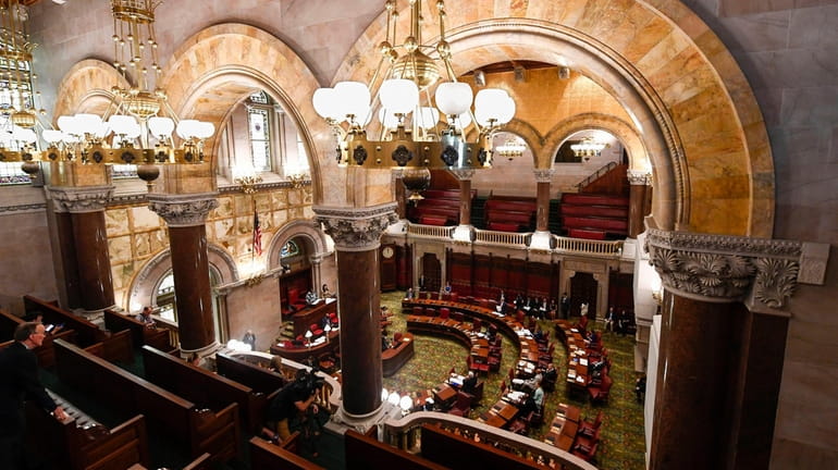  Members of the New York Senate debate legislation in Albany.