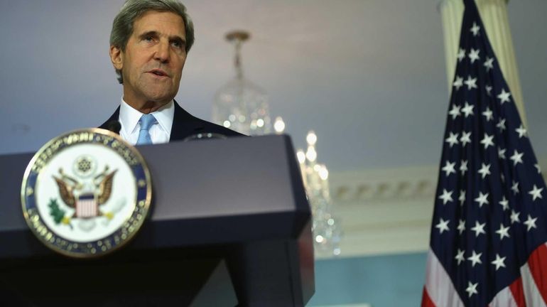 Secretary of State John Kerry makes a statement at the...