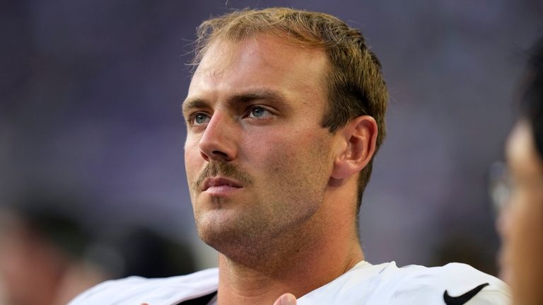 Las Vegas Raiders tight end Brock Bowers watches from the...