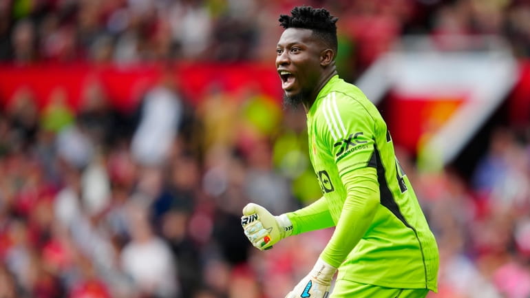Manchester United's goalkeeper Andre Onana reacts during the English Premier...
