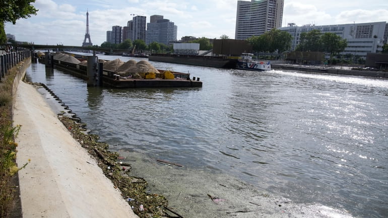 The Seine river flows Friday, June 28, 2024 in Paris....