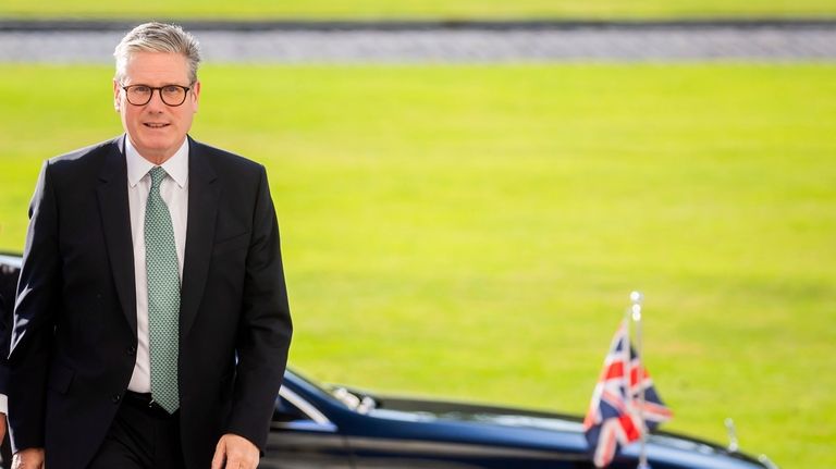 Britain's Prime Minister Keir Starmer arrives at Bellevue presidential Palace...