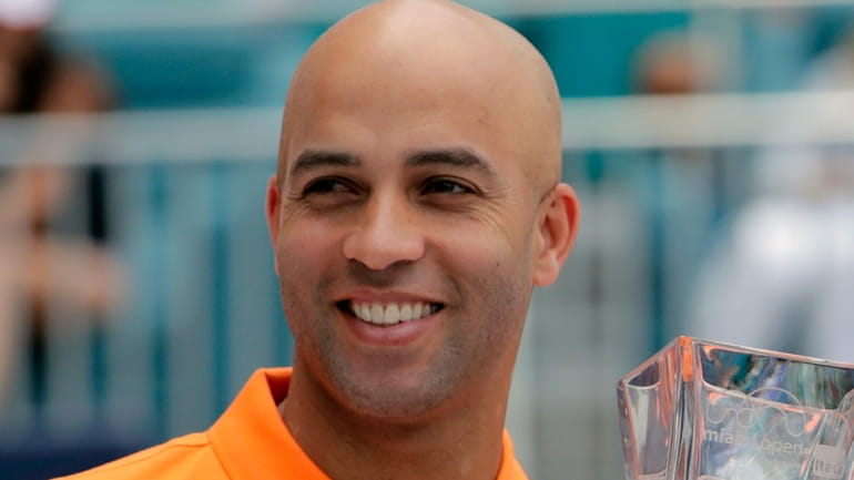 James Blake, director of the Miami Open tennis tournament, smiles...