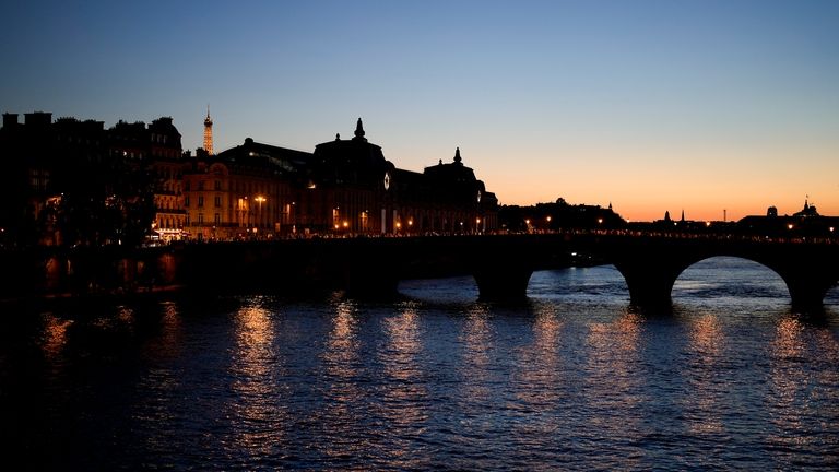 A view of the Seine River is pictured at sunset...