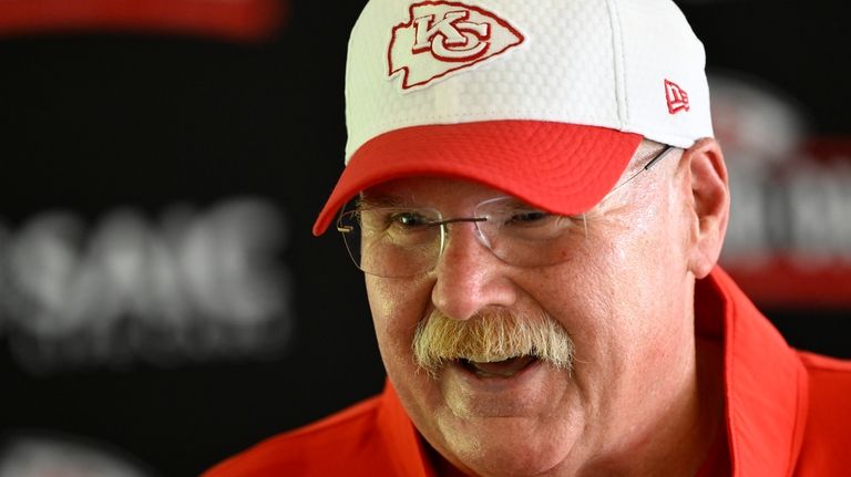 Kansas City Chiefs head coach Andy Reid answers questions from...