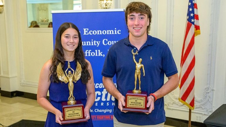 Gienn's Lauren LaMena, left, and East Islip's Matt McIntee pose with their...