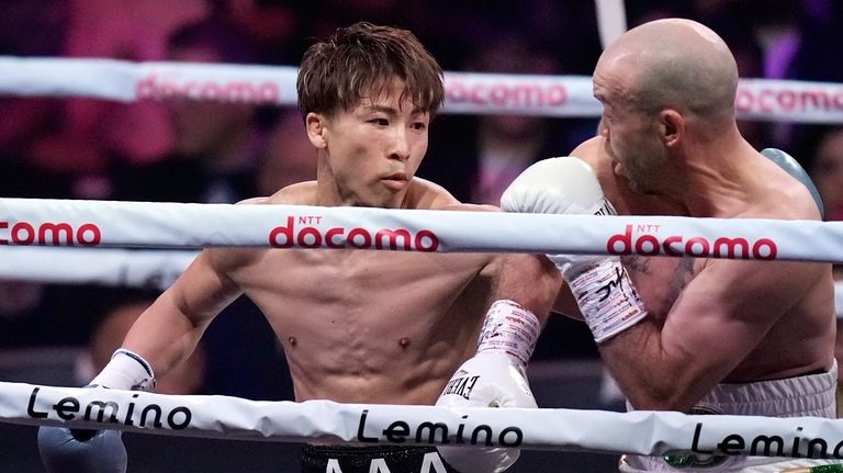 Japanese champion Naoya Inoue, left, and Irish challenger TJ Doheny,...