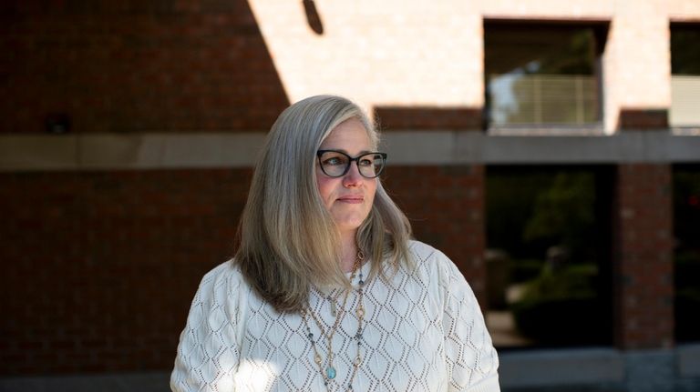 Adeline Hambley, Ottawa County, Mich., health officer, poses for a...