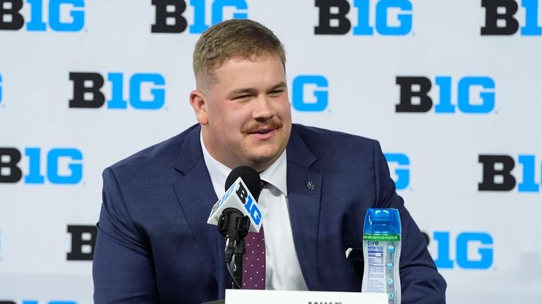 Indiana's Mike Katic speaks during an NCAA college football news...