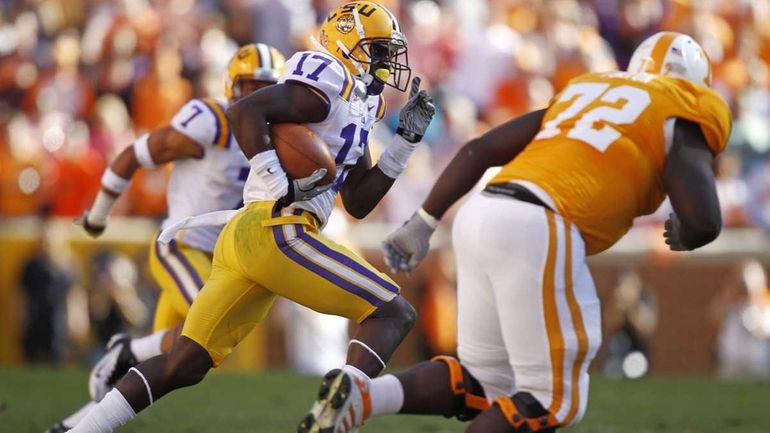 LSU cornerback Morris Claiborne (17) runs back an interception 89-yards...