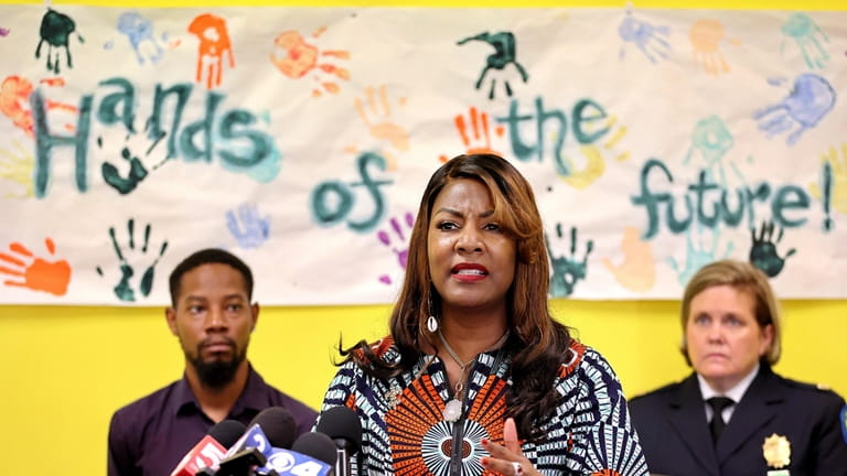 St. Louis Mayor Tishaura O. Jones, center, speaks during a...