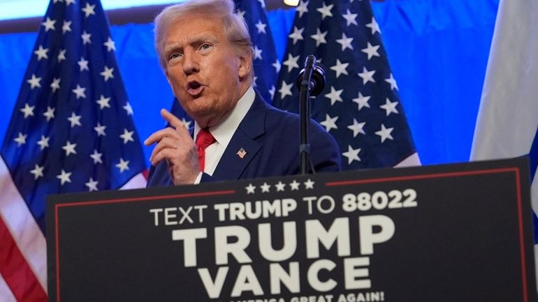 Republican presidential nominee former President Donald Trump speaks during an...