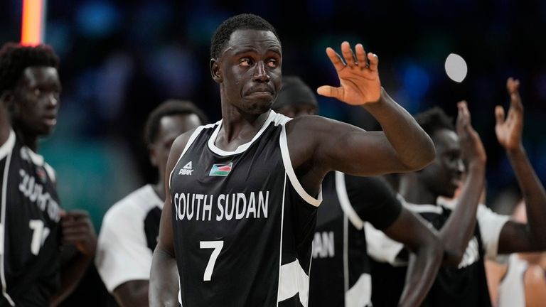 South Sudan's Bul Kuol walks off the court after being...