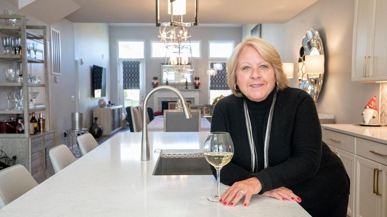 Mary Granshaw in the kitchen area of her 2-bedroom 2½-bath townhouse at...