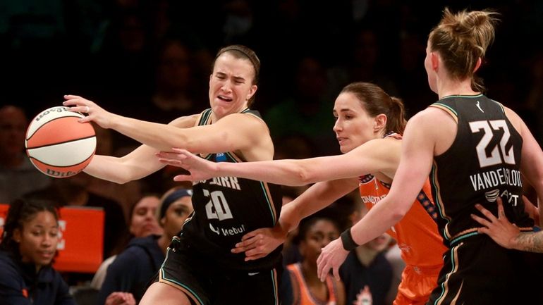 Sabrina Ionescu of the Liberty is pressured in the second...