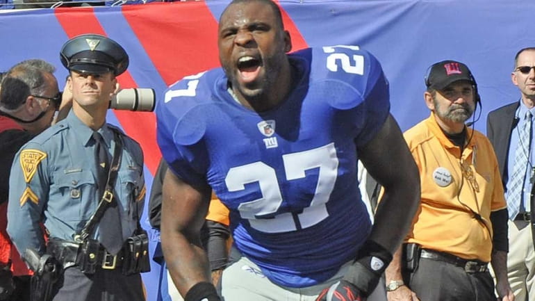 Brandon Jacobs yells to the crowd before a 2010 game...
