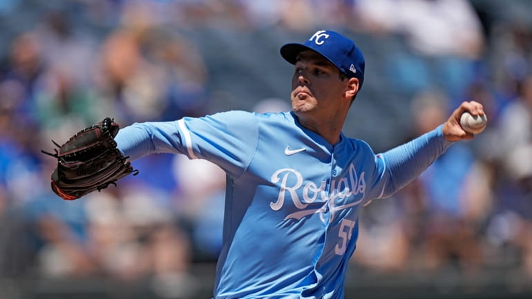 Kansas City Royals starting pitcher Cole Ragans throws during the...