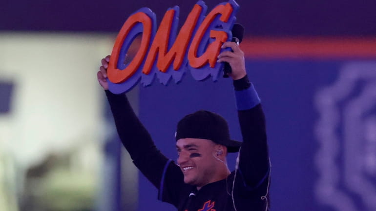 Jose Iglesias #11 of the Mets performs his song 'OMG'...